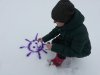В Вышетравино рисовали солнце на снегу